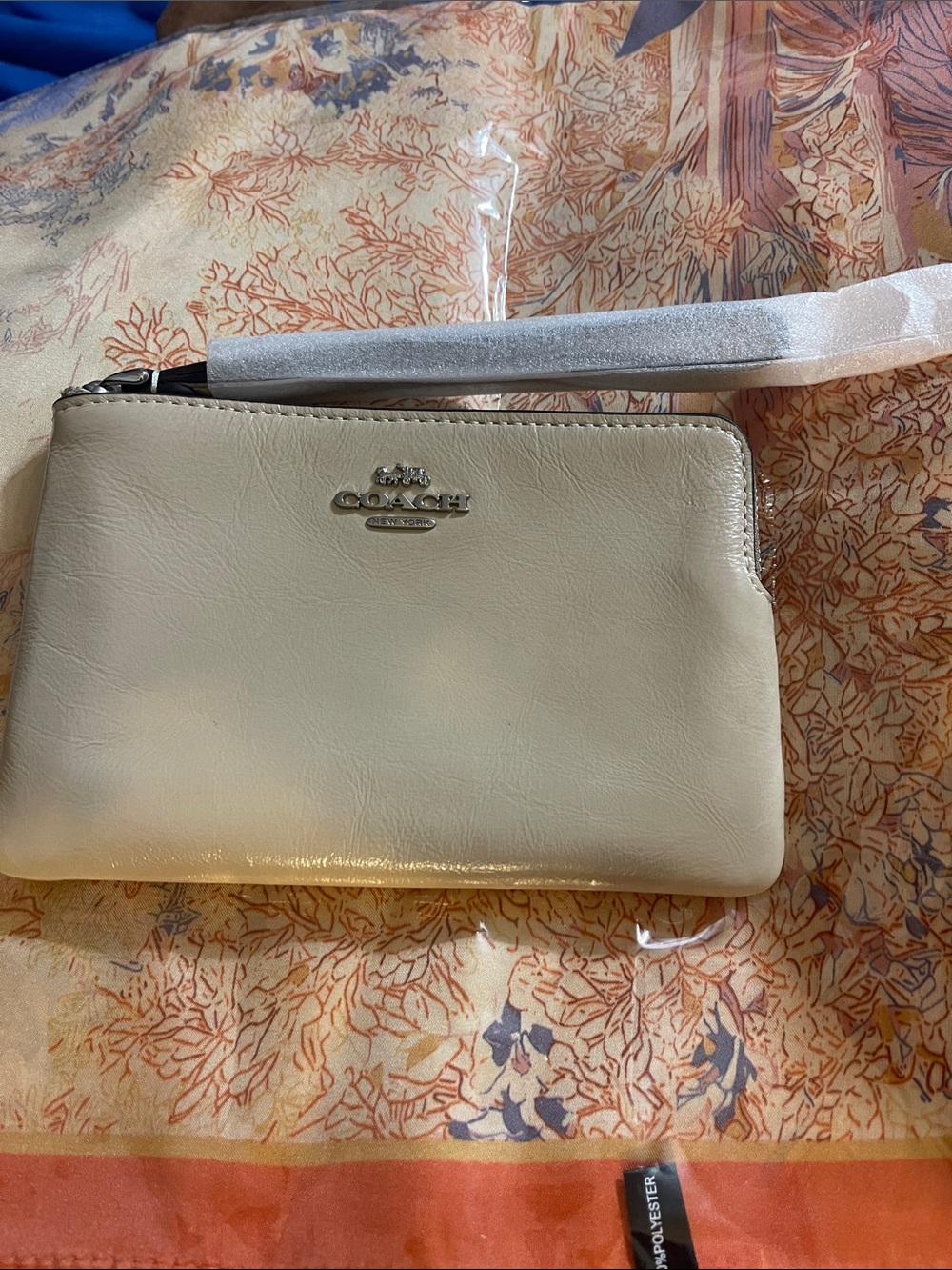 Coach Cream Leather Wristlet with Silver Tone Logo